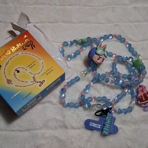 POP LAND EXCLUSIVE Jump Into Summer Thw Monsters Phone Lanyard/charm Conf.